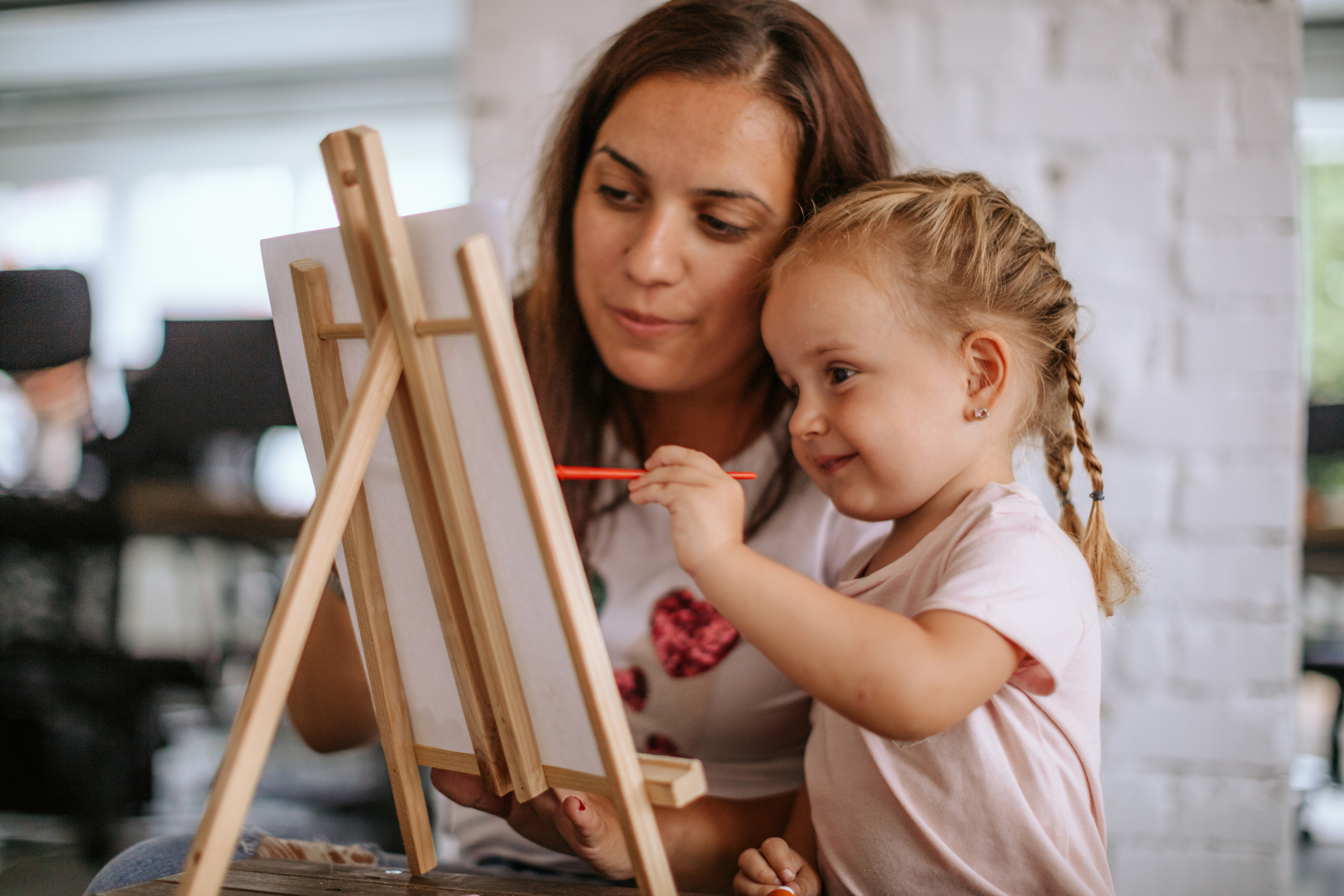 Mom and daughter painting